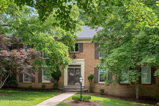 6503 Deep Creek Dr Unit 1, Prospect, KY 40059 - view of front of property featuring a front lawn, brick siding, and roof with shingles