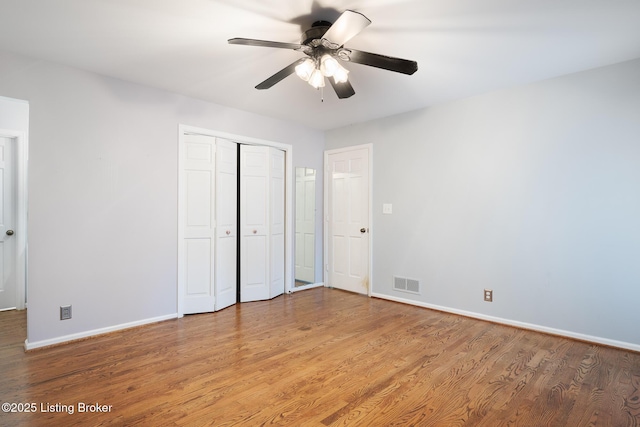 6503 Deep Creek Dr Unit 1, Prospect, KY 40059 - unfurnished bedroom with light wood finished floors, a closet, and a ceiling fan