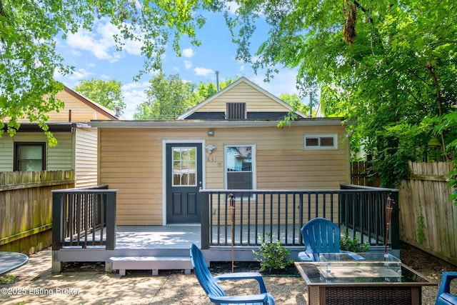 631 Lynn St, Louisville, KY 40217 - back of house with a wooden deck