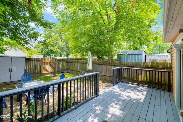 631 Lynn St, Louisville, KY 40217 - wooden deck with a shed and a fenced backyard