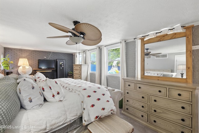 9903 Ponder Ln, Louisville, KY 40272 - bedroom with access to exterior, brick wall, a ceiling fan, and a textured ceiling