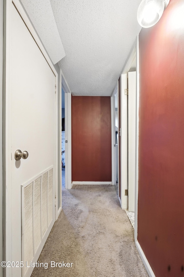 9903 Ponder Ln, Louisville, KY 40272 - hall featuring a textured ceiling and carpet flooring