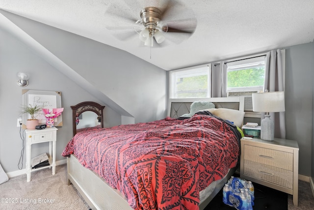 9903 Ponder Ln, Louisville, KY 40272 - bedroom with carpet flooring, vaulted ceiling, a textured ceiling, and a ceiling fan