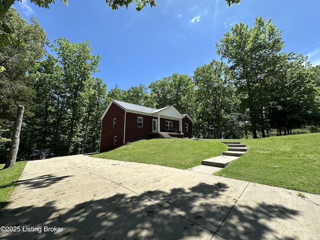 68 Lonnie Lawson Ct, Brandenburg, KY 40108 - view of front of property featuring a front lawn and brick siding