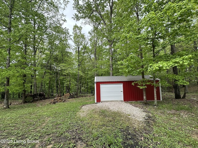 68 Lonnie Lawson Ct, Brandenburg, KY 40108 - detached garage with a wooded view
