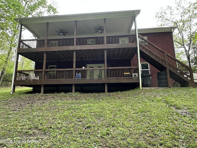 68 Lonnie Lawson Ct, Brandenburg, KY 40108 - back of house featuring a ceiling fan, a deck, stairway, brick siding, and a yard