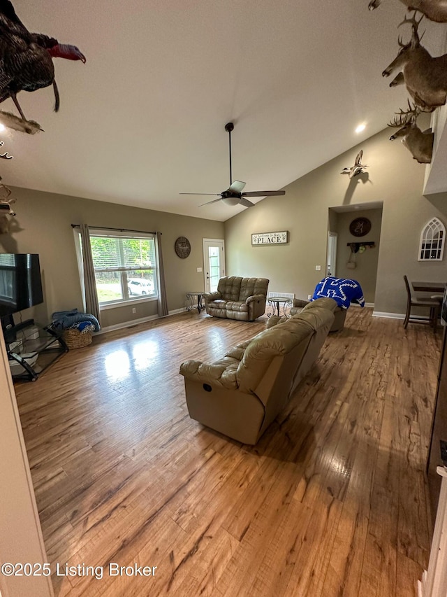 68 Lonnie Lawson Ct, Brandenburg, KY 40108 - living room with wood finished floors, a ceiling fan, and lofted ceiling