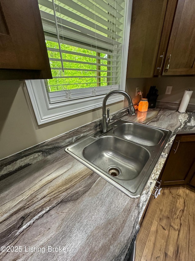 68 Lonnie Lawson Ct, Brandenburg, KY 40108 - kitchen view of wood finished floors and dark brown cabinets