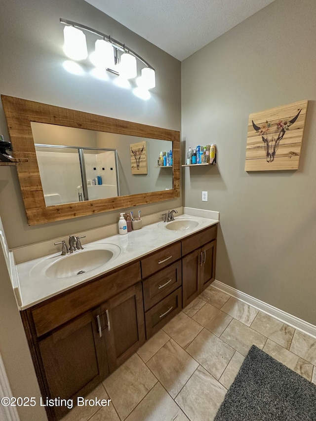 68 Lonnie Lawson Ct, Brandenburg, KY 40108 - full bathroom with double vanity, a textured ceiling, and tile patterned flooring