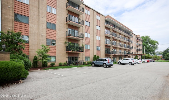 4180 Lyndon Way Unit 409, Louisville, KY 40207 - view of apartment building / complex featuring uncovered parking