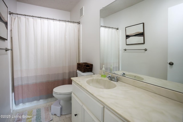 4180 Lyndon Way Unit 409, Louisville, KY 40207 - full bath featuring vanity, tile patterned floors, curtained shower, and a textured ceiling