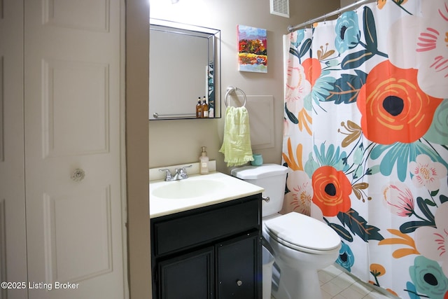 4180 Lyndon Way Unit 409, Louisville, KY 40207 - bathroom featuring vanity, tile patterned floors, and a shower with curtain