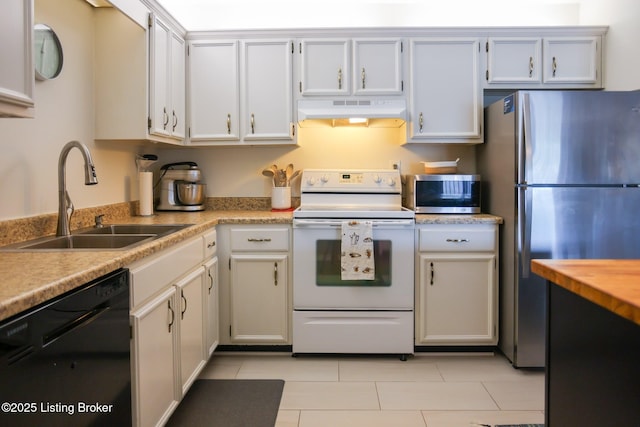 4180 Lyndon Way Unit 409, Louisville, KY 40207 - kitchen with stainless steel appliances, custom range hood, light countertops, and light tile patterned flooring