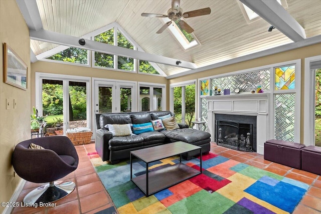 5612 Apache Rd, Louisville, KY 40207 - living area featuring a skylight, a ceiling fan, tile patterned flooring, a fireplace, and french doors
