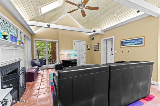 5612 Apache Rd, Louisville, KY 40207 - living area with a fireplace, wooden ceiling, lofted ceiling, a ceiling fan, and light tile patterned flooring