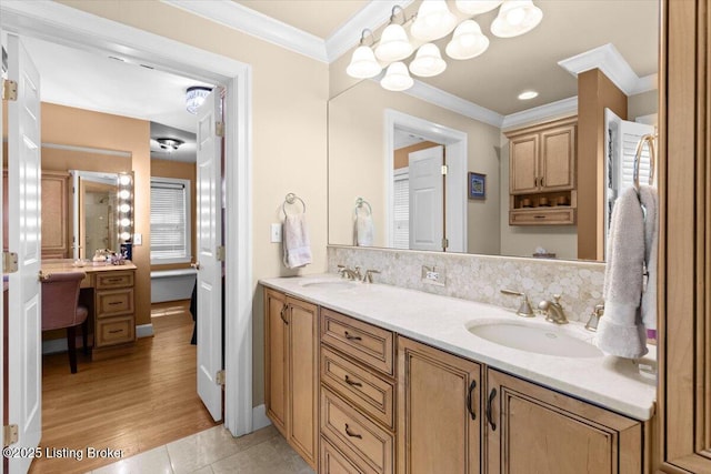 5612 Apache Rd, Louisville, KY 40207 - bathroom featuring double vanity, crown molding, backsplash, and tile patterned flooring