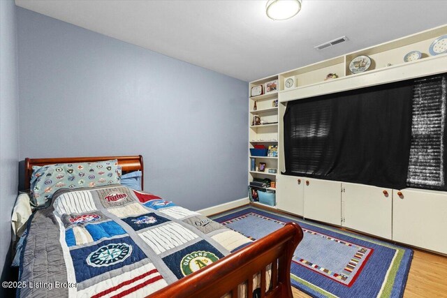 5612 Apache Rd, Louisville, KY 40207 - bedroom featuring light wood-style flooring and baseboards