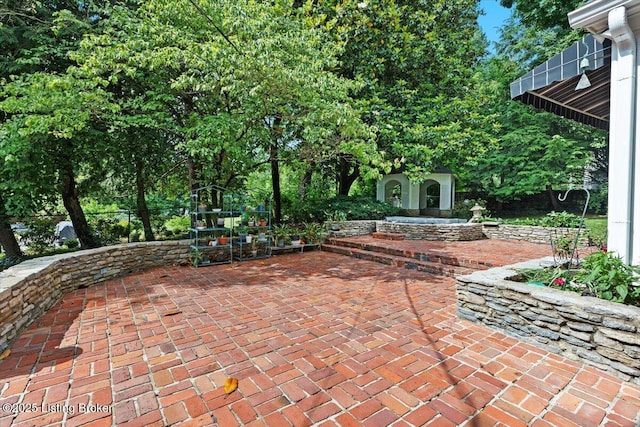 5612 Apache Rd, Louisville, KY 40207 - view of patio featuring an outbuilding