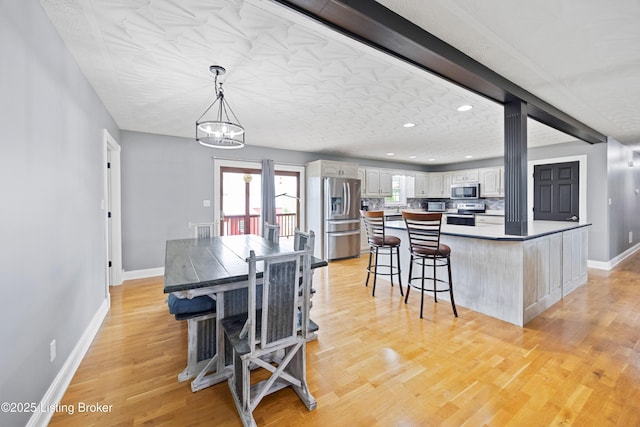 192 Loretto Rd, Springfield, KY 40069 - dining space with light wood finished floors, recessed lighting, and a chandelier