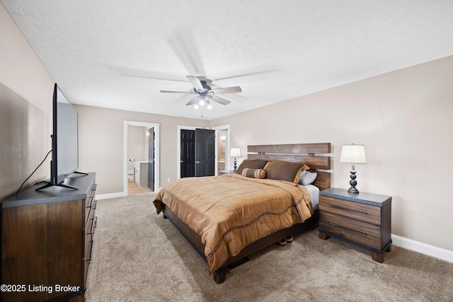 192 Loretto Rd, Springfield, KY 40069 - bedroom featuring light colored carpet, ensuite bathroom, a textured ceiling, and a ceiling fan