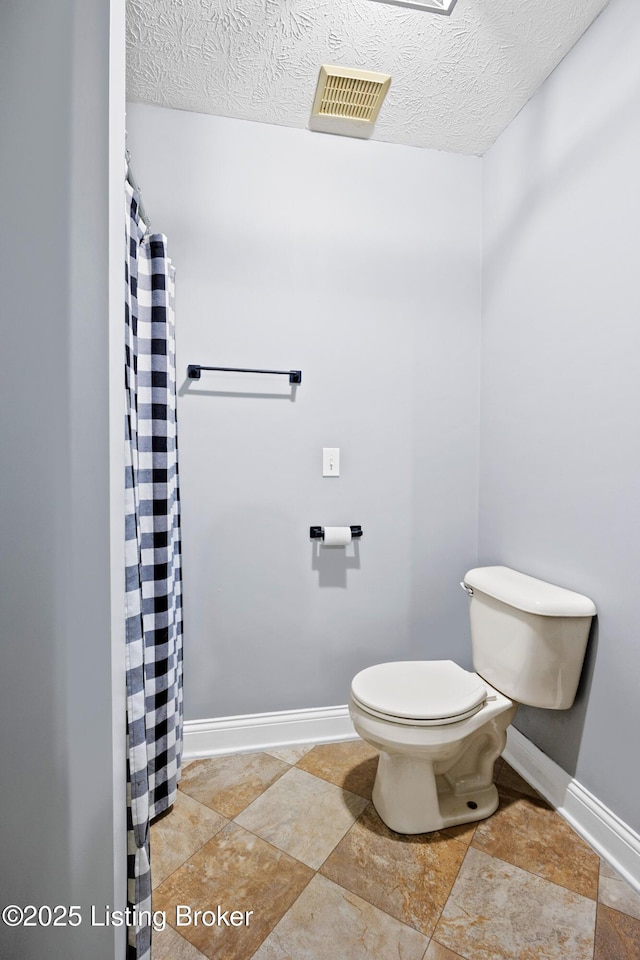 192 Loretto Rd, Springfield, KY 40069 - bathroom featuring a textured ceiling and curtained shower