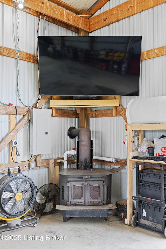 192 Loretto Rd, Springfield, KY 40069 - garage featuring a wood stove and electric panel