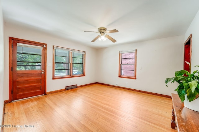 1721 S 4th St, Louisville, KY 40208 - entryway with light wood finished floors and a ceiling fan