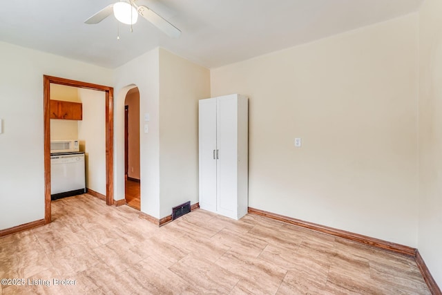 1721 S 4th St, Louisville, KY 40208 - unfurnished bedroom with arched walkways and ceiling fan