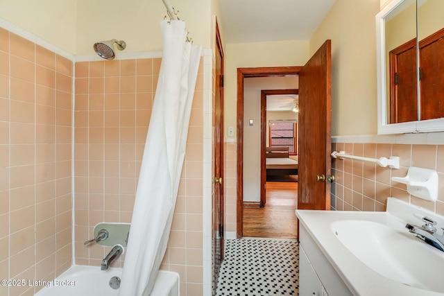 1721 S 4th St, Louisville, KY 40208 - full bathroom featuring shower / tub combo with curtain, tile walls, vanity, and wainscoting