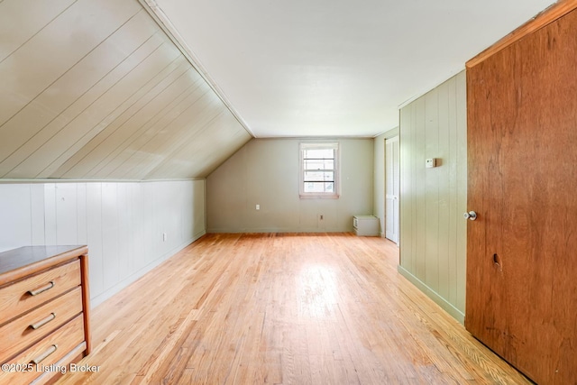 1721 S 4th St, Louisville, KY 40208 - additional living space with light wood-style floors and vaulted ceiling