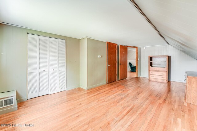 1721 S 4th St, Louisville, KY 40208 - bonus room with light wood finished floors, lofted ceiling, and wood walls
