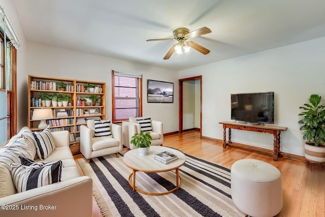 1721 S 4th St, Louisville, KY 40208 - living area featuring ceiling fan and wood finished floors