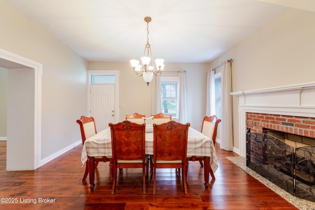 2990 Cedar Grove Rd, Shepherdsville, KY 40165 - dining room with a chandelier, wood finished floors, and a fireplace