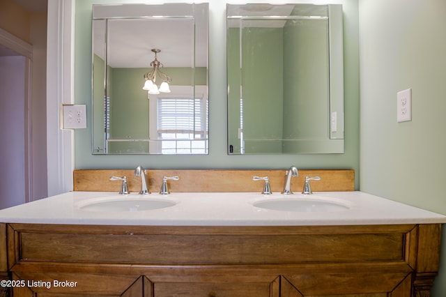 2990 Cedar Grove Rd, Shepherdsville, KY 40165 - full bathroom with double vanity and a chandelier