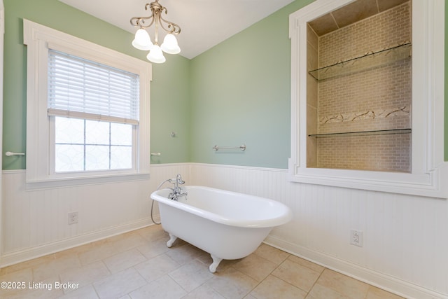 2990 Cedar Grove Rd, Shepherdsville, KY 40165 - full bathroom featuring wainscoting, a soaking tub, plenty of natural light, a chandelier, and tile patterned floors