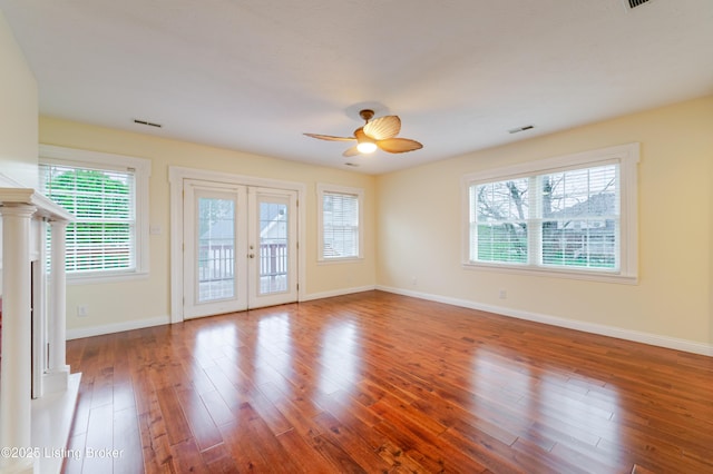 2990 Cedar Grove Rd, Shepherdsville, KY 40165 - empty room featuring a ceiling fan, healthy amount of natural light, wood finished floors, and french doors