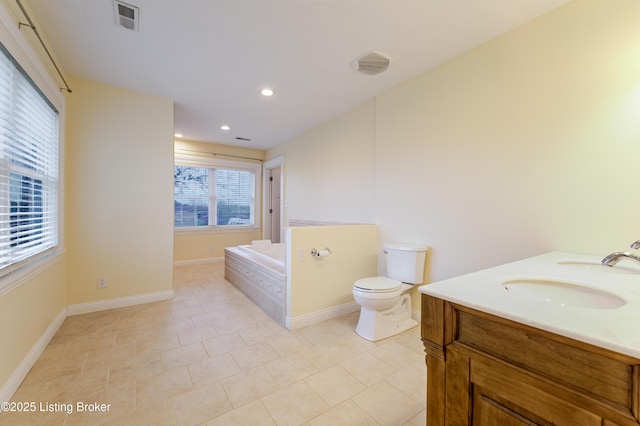 2990 Cedar Grove Rd, Shepherdsville, KY 40165 - bathroom featuring a garden tub, double vanity, tile patterned floors, and recessed lighting