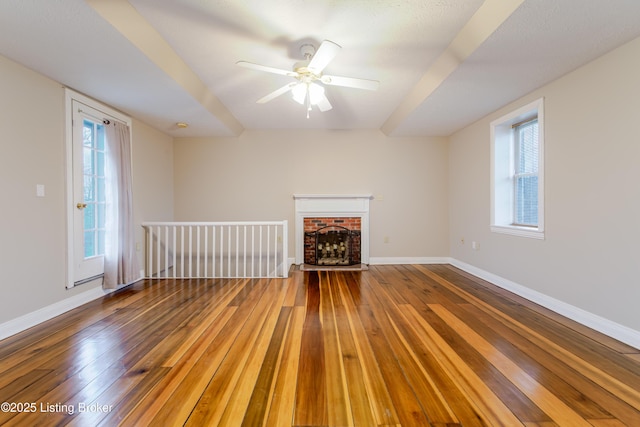 2990 Cedar Grove Rd, Shepherdsville, KY 40165 - unfurnished living room featuring hardwood / wood-style floors, plenty of natural light, a brick fireplace, and ceiling fan