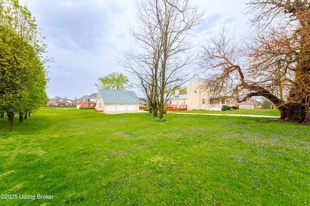 2990 Cedar Grove Rd, Shepherdsville, KY 40165 - view of green lawn with a garage