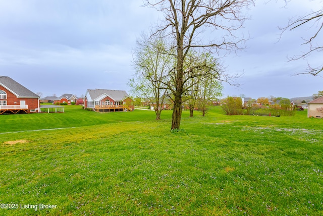 2990 Cedar Grove Rd, Shepherdsville, KY 40165 - view of green lawn with a wooden deck