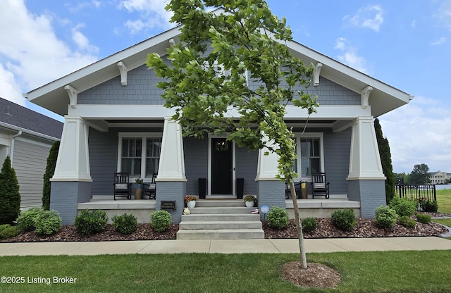 6015 St Bernadette Ave, Prospect, KY 40059 - craftsman-style home with covered porch and a front lawn