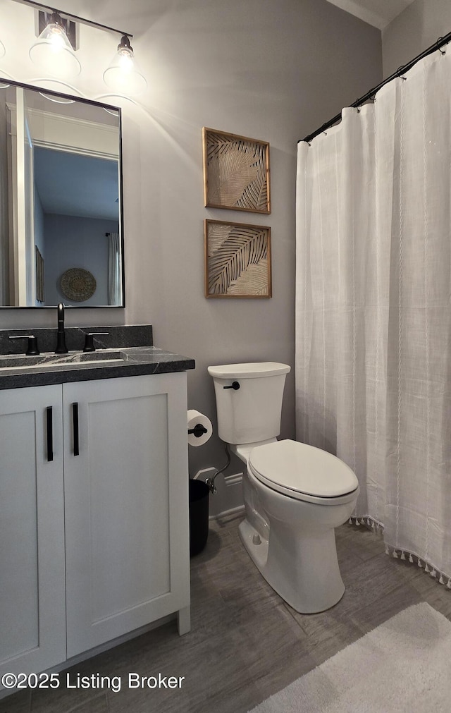 6015 St Bernadette Ave, Prospect, KY 40059 - bathroom with wood finished floors and vanity
