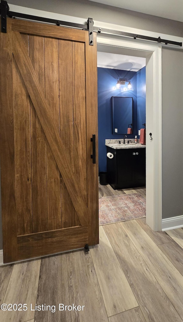 6015 St Bernadette Ave, Prospect, KY 40059 - bathroom featuring wood finished floors and vanity