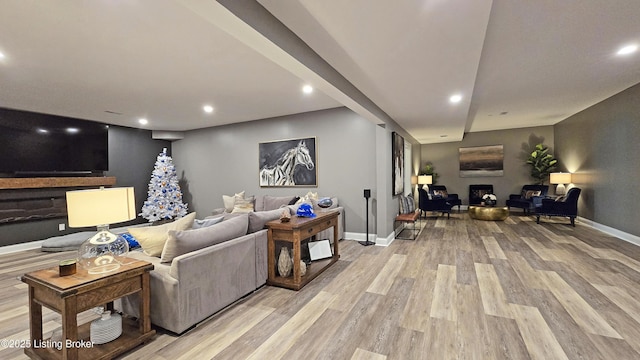 6015 St Bernadette Ave, Prospect, KY 40059 - living room featuring a fireplace, light wood-type flooring, and recessed lighting