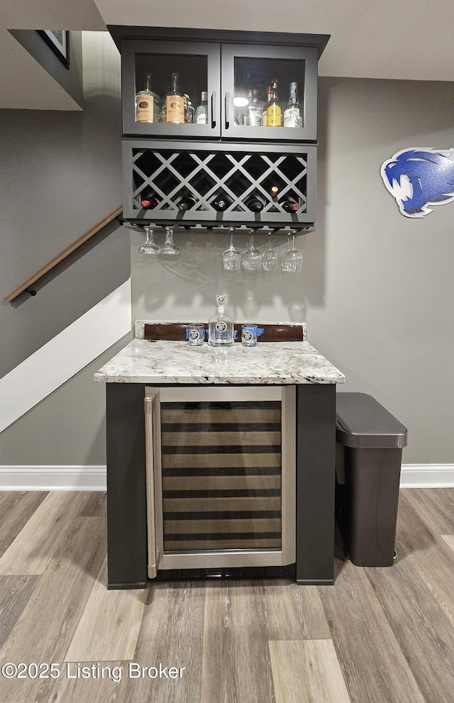 6015 St Bernadette Ave, Prospect, KY 40059 - indoor dry bar featuring beverage cooler and light wood-style flooring
