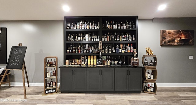 6015 St Bernadette Ave, Prospect, KY 40059 - indoor dry bar featuring light wood-style floors and baseboards