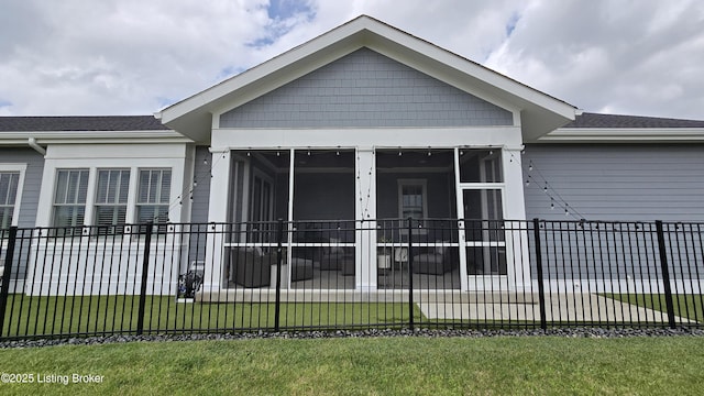 6015 St Bernadette Ave, Prospect, KY 40059 - back of house featuring a sunroom, a shingled roof, and a patio