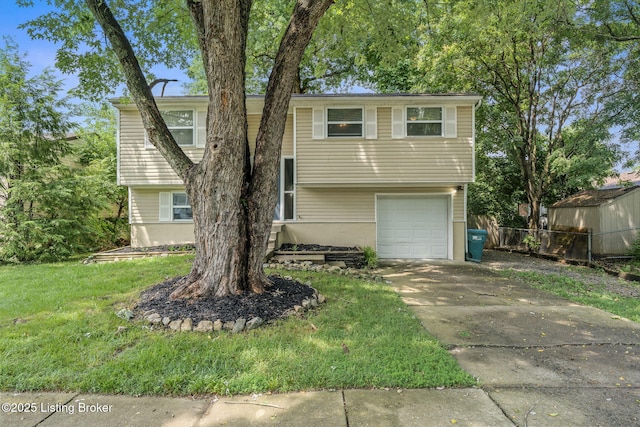3619 Endeavor Way, Louisville, KY 40219 - split foyer home featuring a garage and concrete driveway