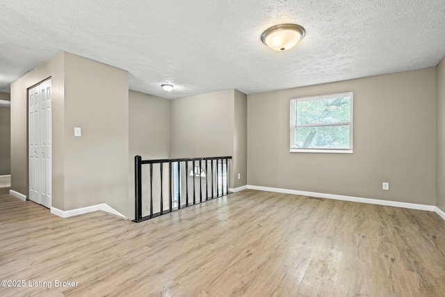 3619 Endeavor Way, Louisville, KY 40219 - unfurnished room featuring a textured ceiling and wood finished floors