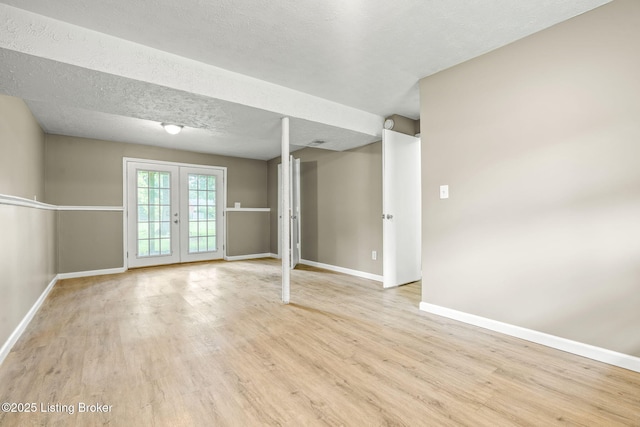 3619 Endeavor Way, Louisville, KY 40219 - unfurnished room featuring wood finished floors, french doors, and a textured ceiling